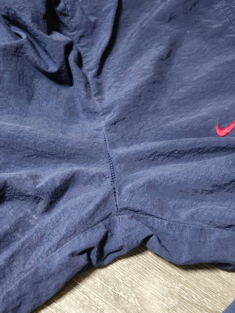 Vintage Nike Navy Blue Track Pants with Red Swoosh
